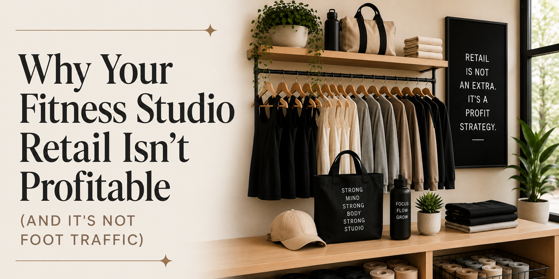 Modern boutique fitness studio retail display with neutral activewear, minimalist merchandising, and editorial typography reading “Why Your Fitness Studio Retail Isn’t Profitable (And It’s Not Foot Traffic)” in a clean, luxury-inspired studio setting.